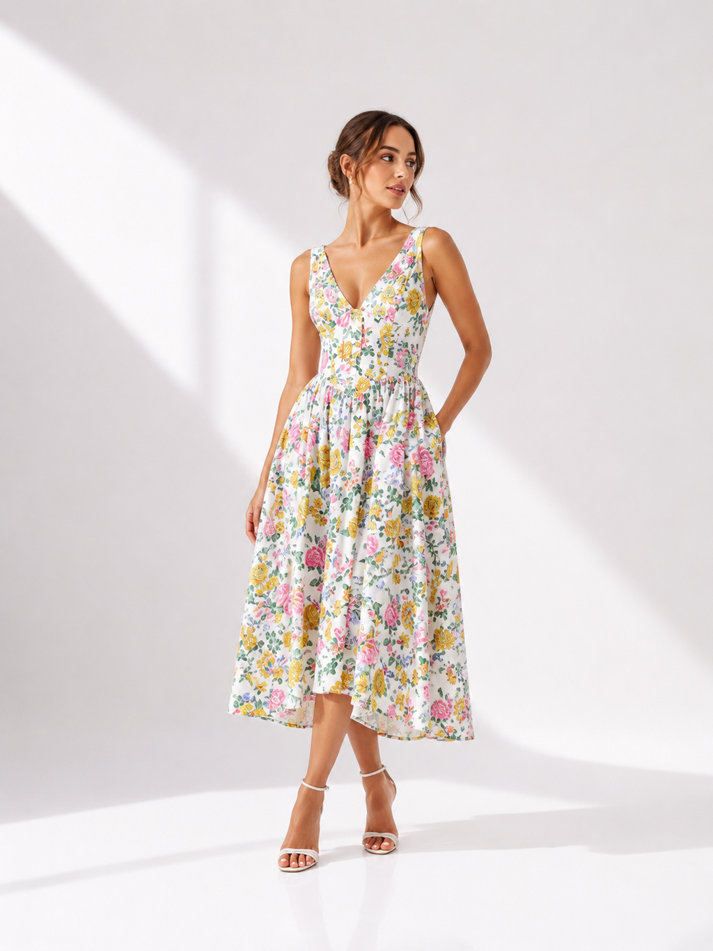 Woman wearing a floral dress on a white background