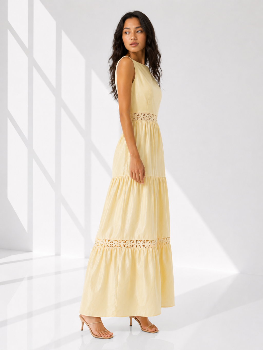 Woman wearing a light yellow dress with text on a white background
