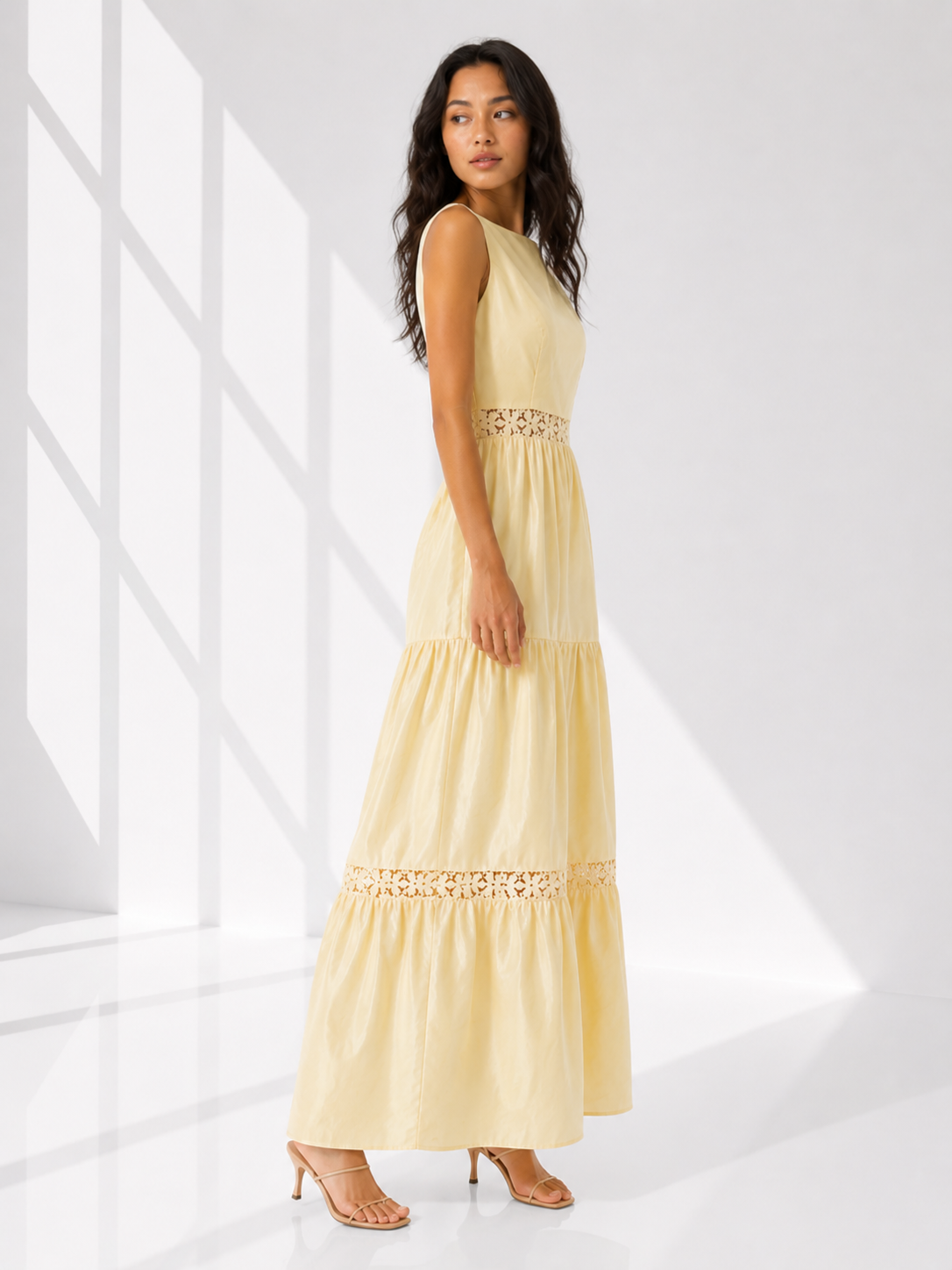 Woman wearing a light yellow dress with text on a white background