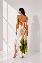 Woman wearing a floral dress with a white background