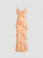 Floral dress with ruffled layers on a white background