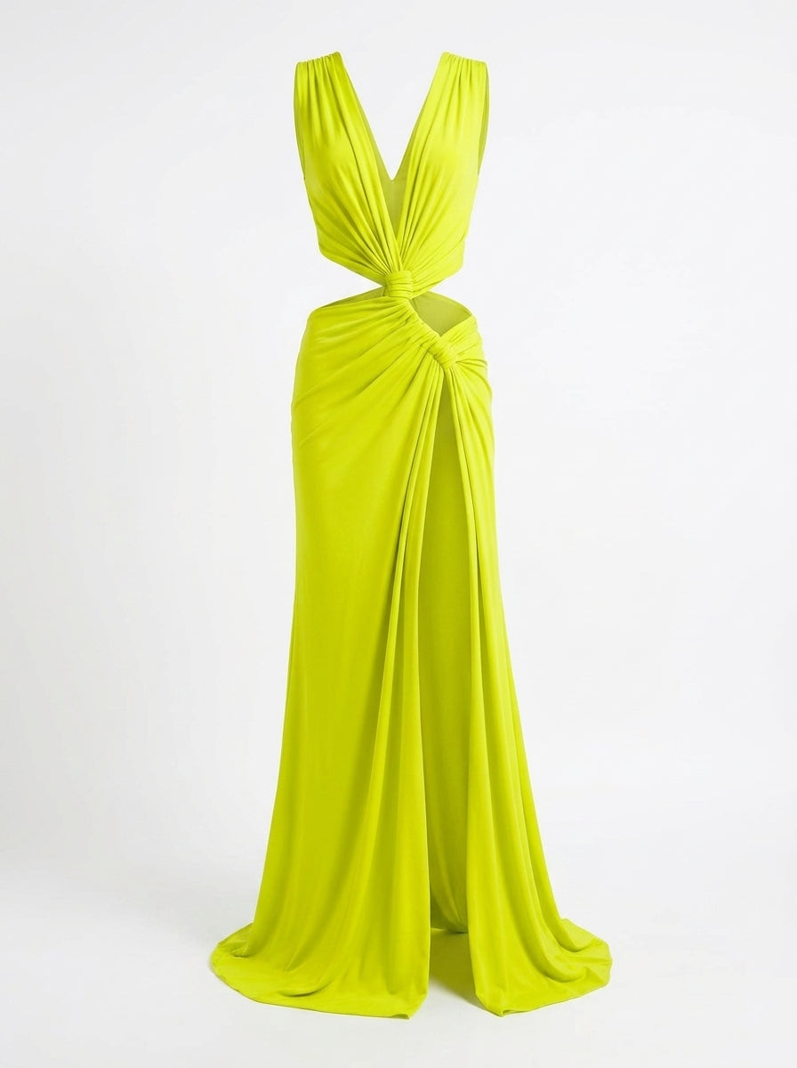 Lime green evening gown with a deep neckline and side draping on a white background
