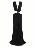 Black evening gown with a deep neckline on a white background