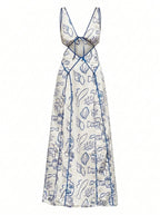 White dress with blue leaf pattern on a white background