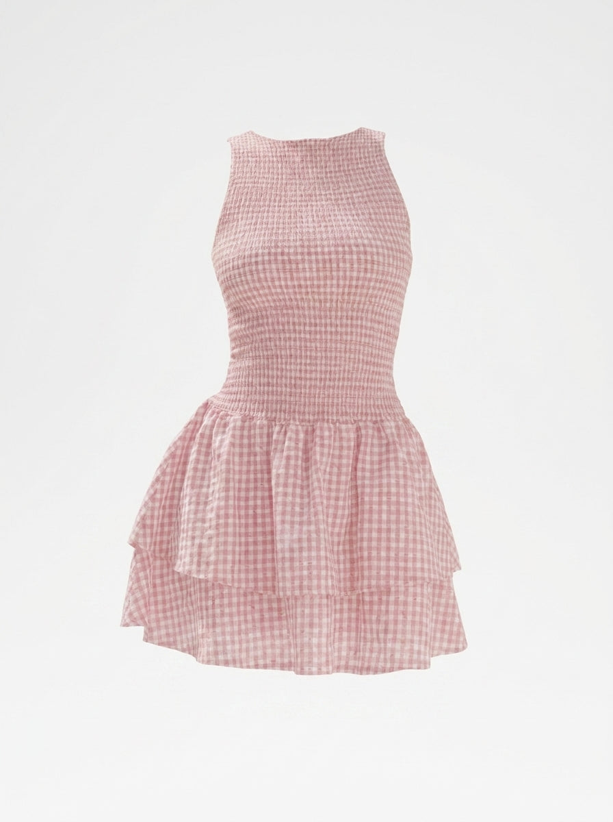 Pink checkered dress on a light gray background