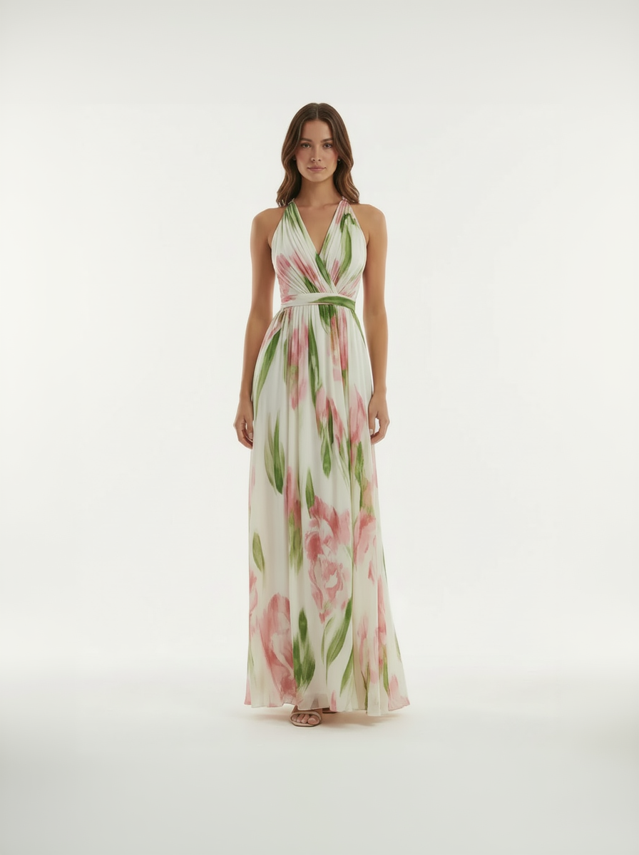 Woman wearing a floral maxi dress on a white background